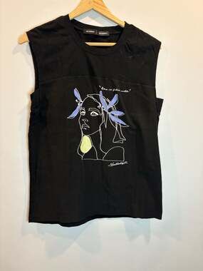 EnC Studios 'She is filled with nostalgia' graphic sleeveless muscle tank top